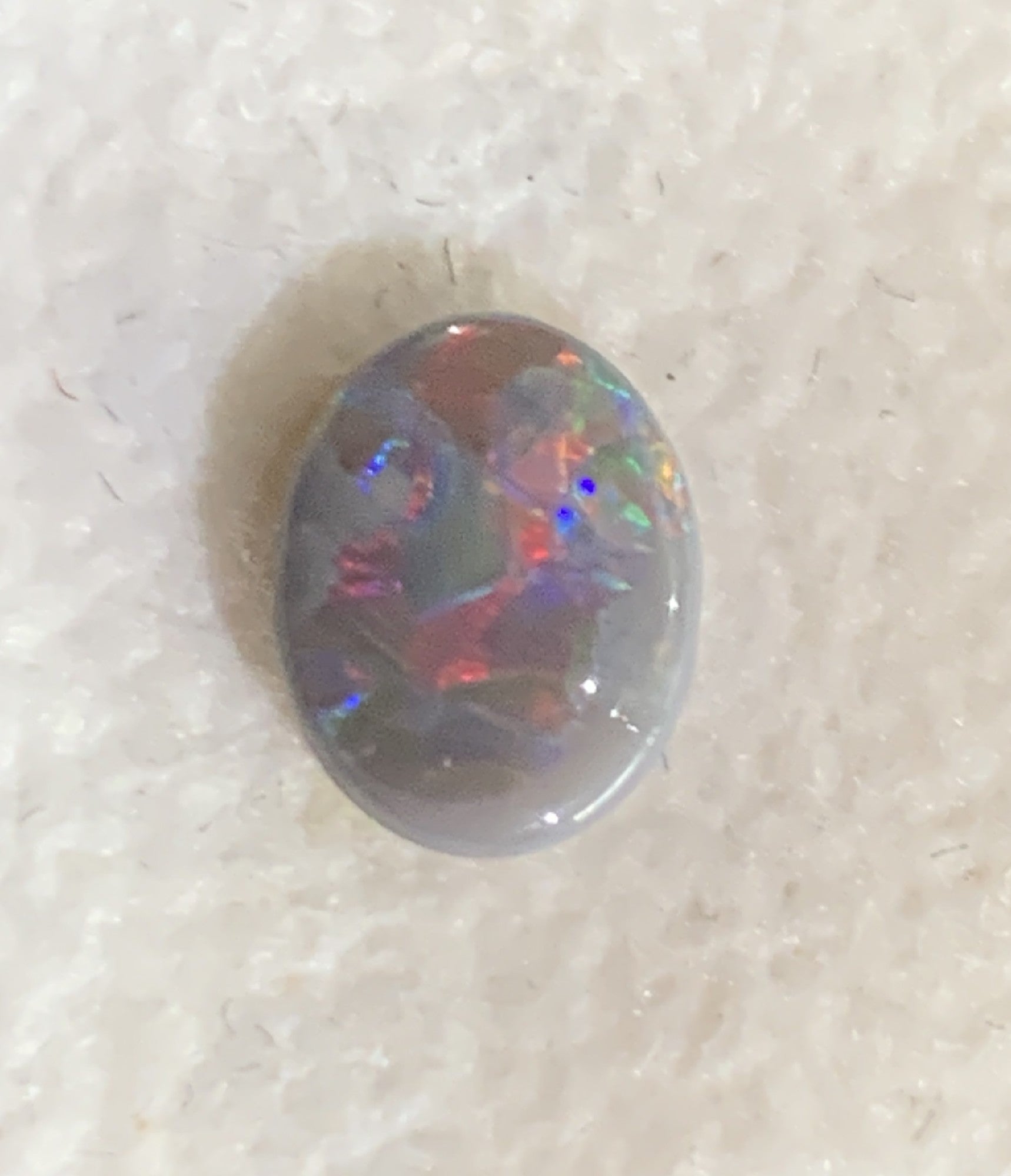 One Black Opal 0.8ct Oval shape