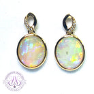 14kt Yellow Gold dangling Oval Opal earrings 5.1ct