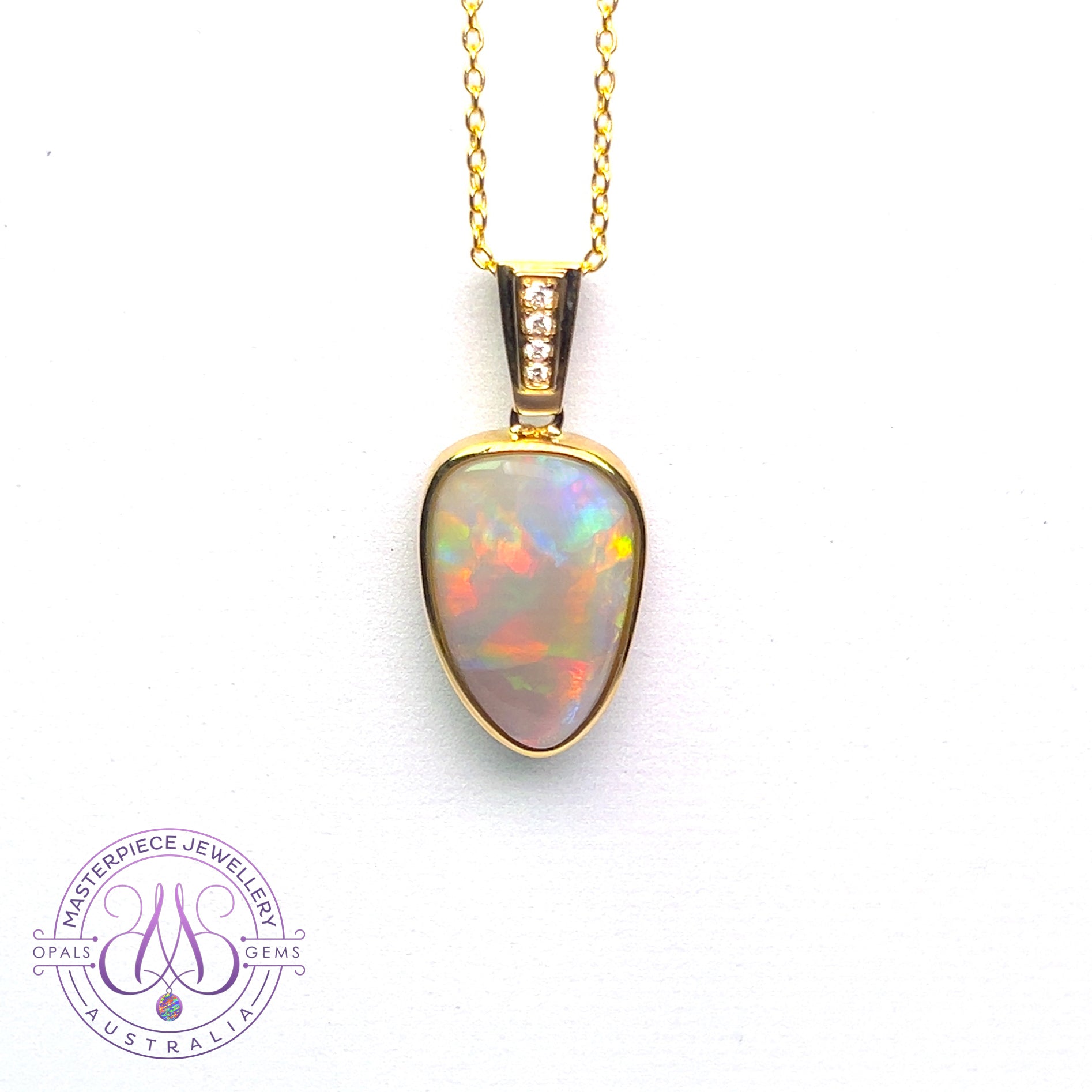 14kt Yellow Gold Black Opal triangular shape pendant with diamonds