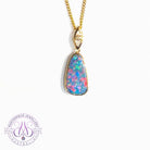 14kt Yellow Gold teardrop shape Opal fire doublet with diamond pendant