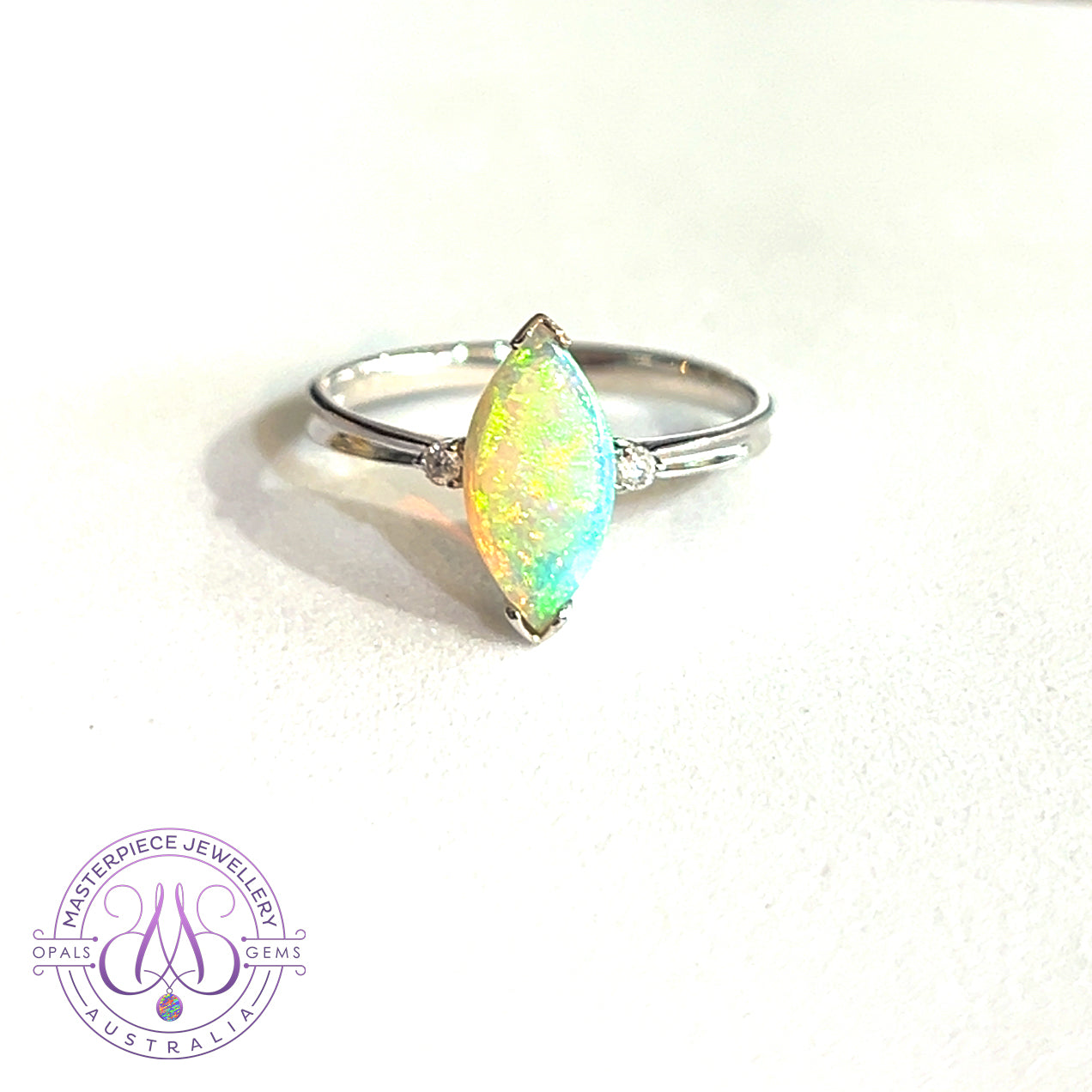 18kt White Gold Marquise Crystal Opal and diamond ring