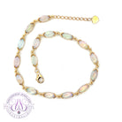 9kt Yellow Gold Marquise shape V claw Light Opal bracelet 21.5cm