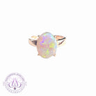 One 9kt Rose Gold solitaire ring 14x11mm Black Opal Green colour 4.36ct