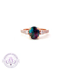 One 18kt Rose Gold Black Opal and Light Pink diamond ring