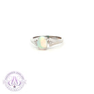 One Sterling Silver 8x6mm Light Opal and side cz ring