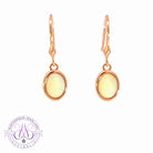 Rose Gold plated Silver danglng bezel set White Opals on hooks