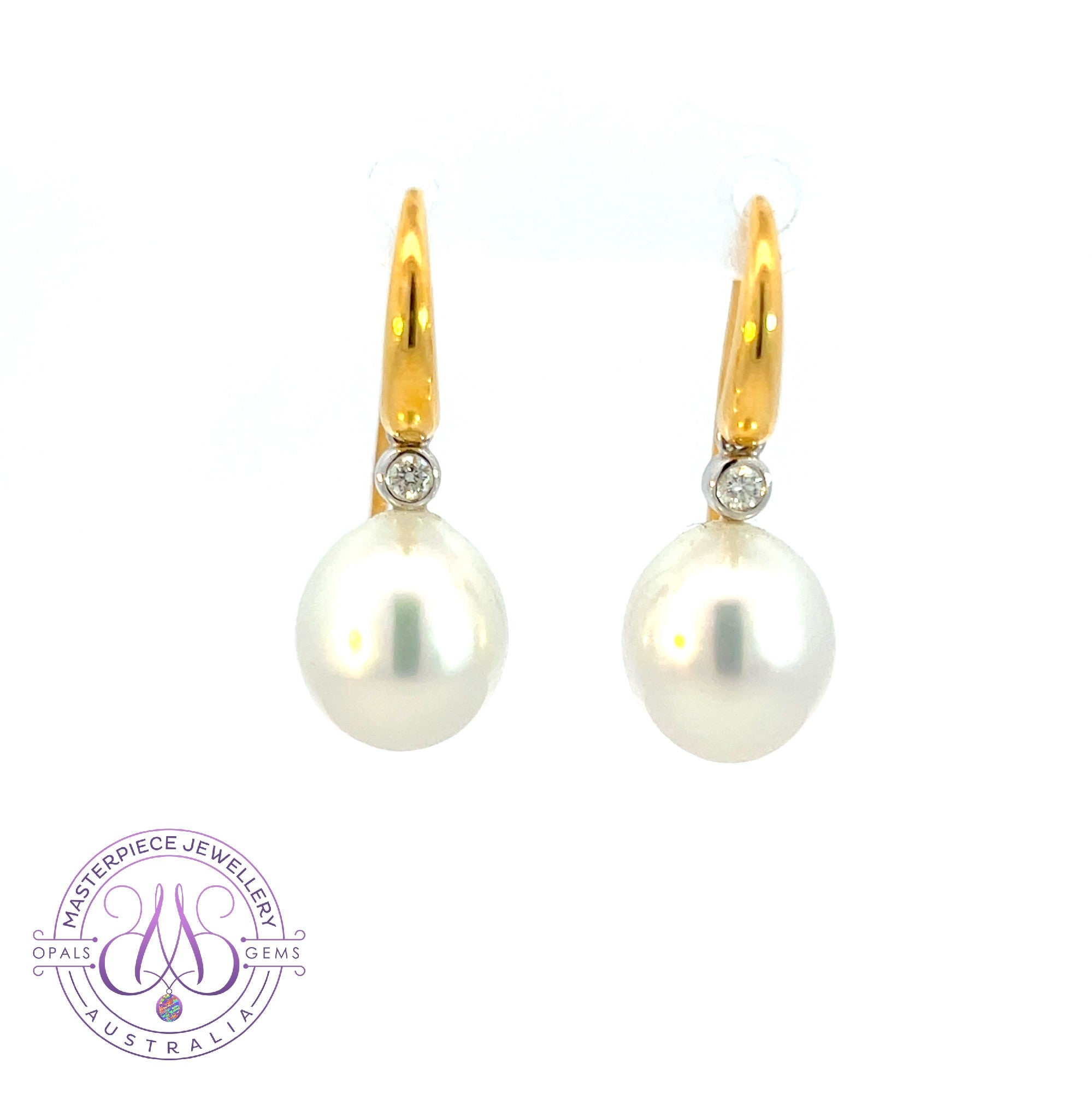 18kt Yellow Gold hanging South Sea Pearl Oval shape 10-11mm with diamond earrings