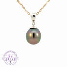 18kt White Gold Black Pearl 12mm and diamond pendant