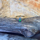 18kt Yellow Gold solitaire ring set with one 0.65ct Black Opal - Masterpiece Jewellery Opal & Gems Sydney Australia | Online Shop