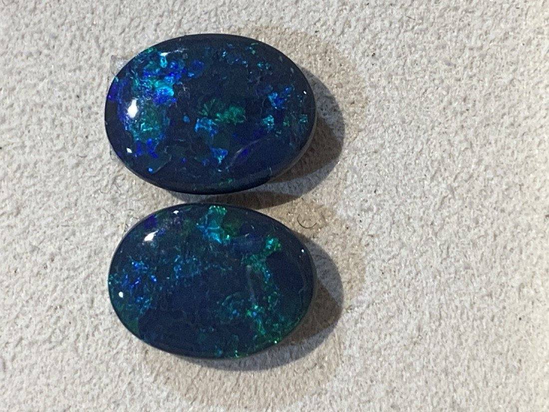 Australian black opal cobalt offers blue mixed shapes three stone Parcel designer gems largest is 14 mm x 6 mm x 3 mm deep. Total weight 4.5 carats